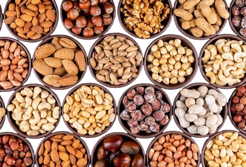 set-pecan-pistachios-almond-peanut-cashew-pine-nuts-lined-up-assorted-nuts-dried-fruits-mini-different-bowls-1024x696-removebg-preview
